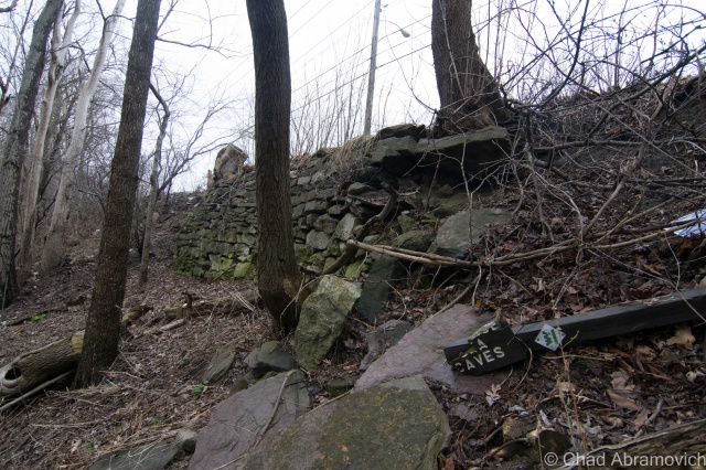 On the hike back up, I found something sort of cool, what appeared to be an old stone retaining wall that holds up North Avenue from collapsing down into the dark pools below. The wall is most likely as old as when the road was first "modernized", but I'm just assuming. Also located here was the BHS litter gardens - giving an incite into local culture and their eating habits. 