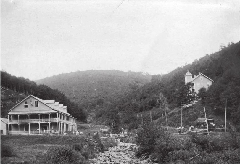 The village of South Glastenbury circa 1897. Bolles Brook is in the middle of the photo. The hotel (former logger's boardinghouse) is to the left, with the double story porch, and the casino (former company store), is up the hill a ways to the right. You can also see the electric trolly on the lower right hand corner of the photo - the same tracks we hiked to get up into town. 