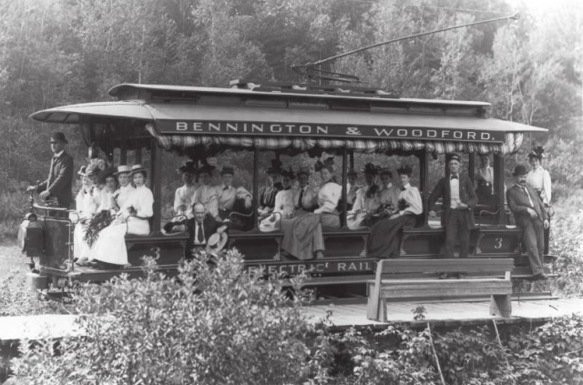 A classic image of The Bennington and Woodford Trolley, filled with nicely dress women on their way to Glastenbury. 